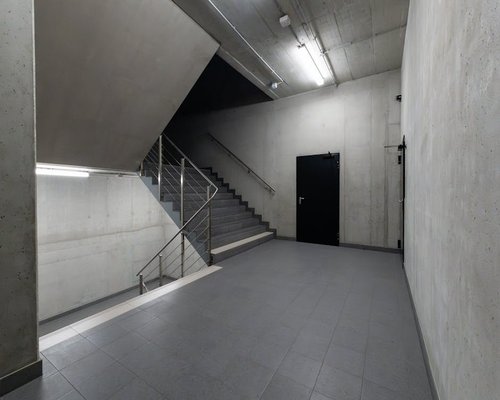 Office corridor with elevator and stairs options